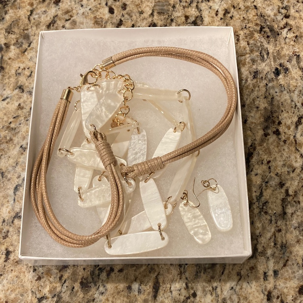 Necklace and earrings, like new. Worn to 2 weddings.